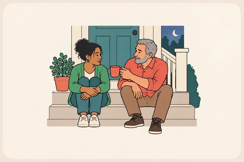 On a front step in the evening, a man holding a mug sits beside a woman who hugs her knees, and the two of them talk quietly.