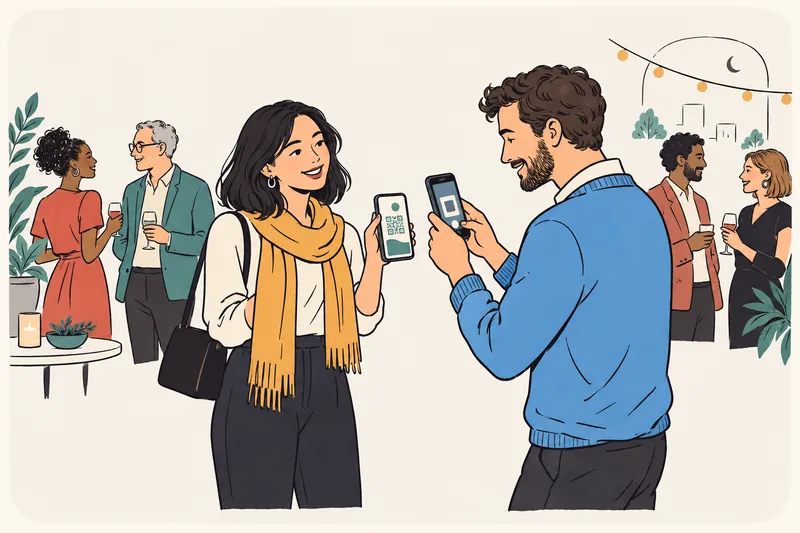 At an evening event, a woman holds out her phone with her card on it while a man scans its code with his own phone.